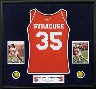 Syracuse jersey and lacrosse photos in frame.