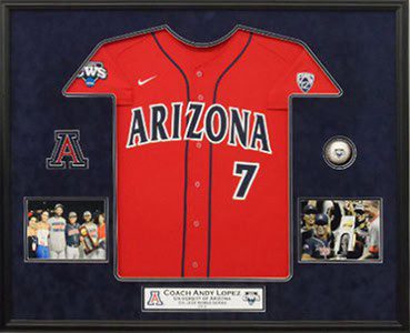 Red Arizona jersey in framed display case.