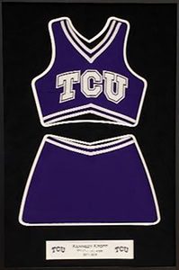 Purple TCU cheerleader uniform in frame.