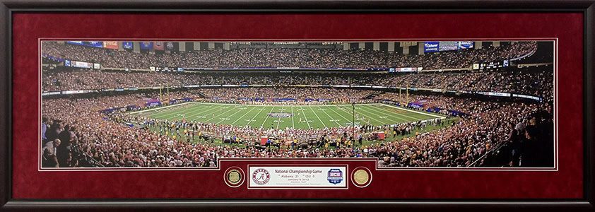 Framed panoramic photo of a football stadium.